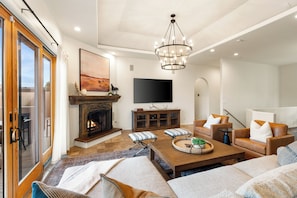 Smart TV, fireplace, table tennis, books