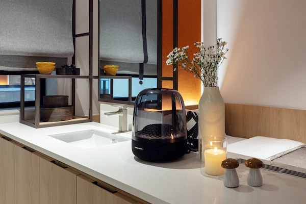 Premium bedding, blackout curtains, soundproofing, free WiFi