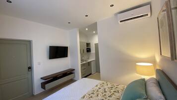 1 habitación, tabla de planchar con plancha, wifi y ropa de cama