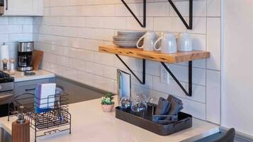 Coffee/tea maker, fridge, microwave, oven