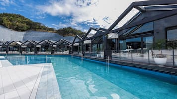 Outdoor pool, open 10:00 AM to 8:00 PM, pool umbrellas