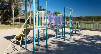 Family Holiday Resort by the Best Beach in NSW with Swimming Pools, Tennis Court