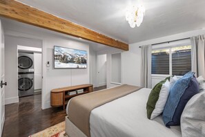 1 bedroom, desk, iron/ironing board, travel crib