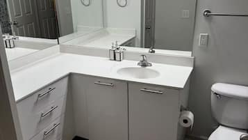 Hair dryer, towels, soap, toilet paper