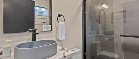 Shower, hair dryer, towels, soap