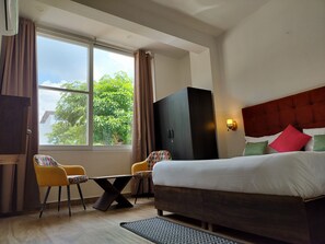 Premium Room | Desk, laptop workspace, soundproofing, free WiFi - Saffron Inn  (Greater Noida)