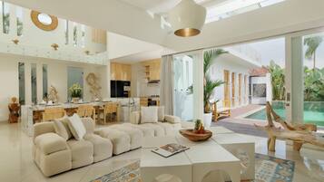 Villa, Pool View | Living area | Flat-screen TV