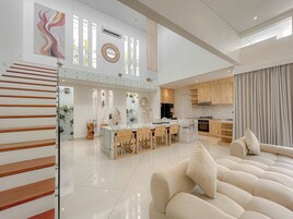 Villa, Pool View | Living area | 42-inch flat-screen TV with digital channels
