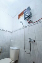 Ducha, toallas, jabón, shampoo