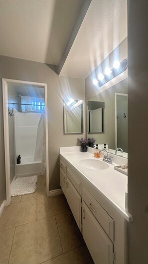 Hair dryer, towels, soap, toilet paper