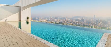 Seasonal outdoor pool, sun loungers, lifeguards on site