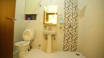 Shower, jetted bath, towels, soap