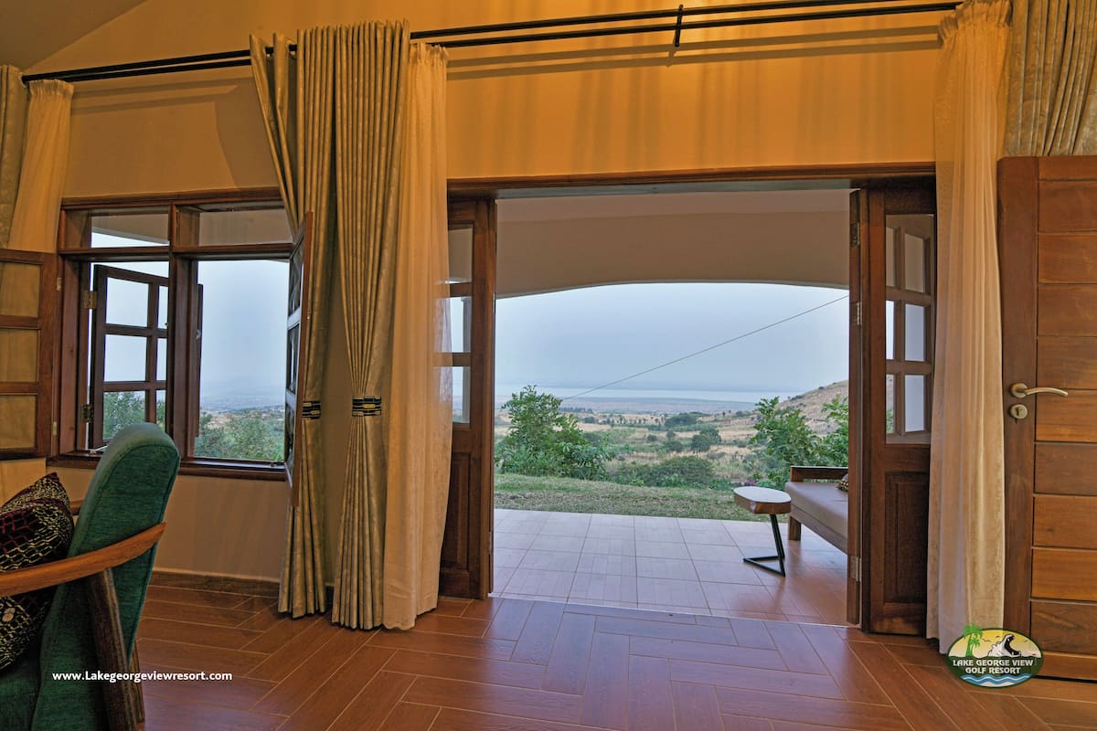 Deluxe Double Room, Lake View | In-room safe, desk, laptop workspace, blackout curtains