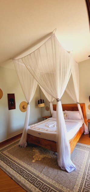 Deluxe Double Room, Courtyard View | Desk, laptop workspace, free WiFi - Njojo Guesthouse (Entebbe)