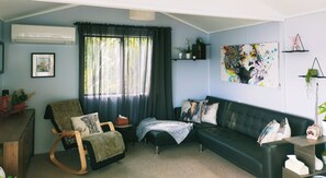 Living area - Waterfront weekend stay. Harbour view. (Pahi)