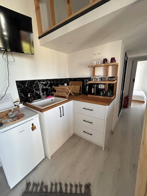 Superior Tiny Home Lake View | Private kitchen | Mini-fridge, coffee/tea maker, electric kettle, cookware/dishes/utensils