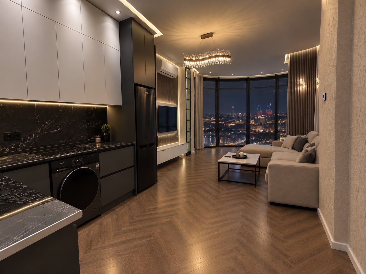 A modern kitchen with a built-in washer and dryer, a dining area with a view of the cityscape, and a living room with a large window.
