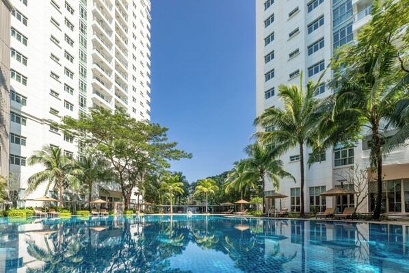 2 outdoor pools, open 6:00 AM to 8:00 PM, pool umbrellas, pool loungers