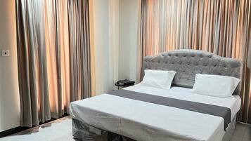 1 slaapkamer, een strijkplank/strijkijzer, wifi, beddengoed