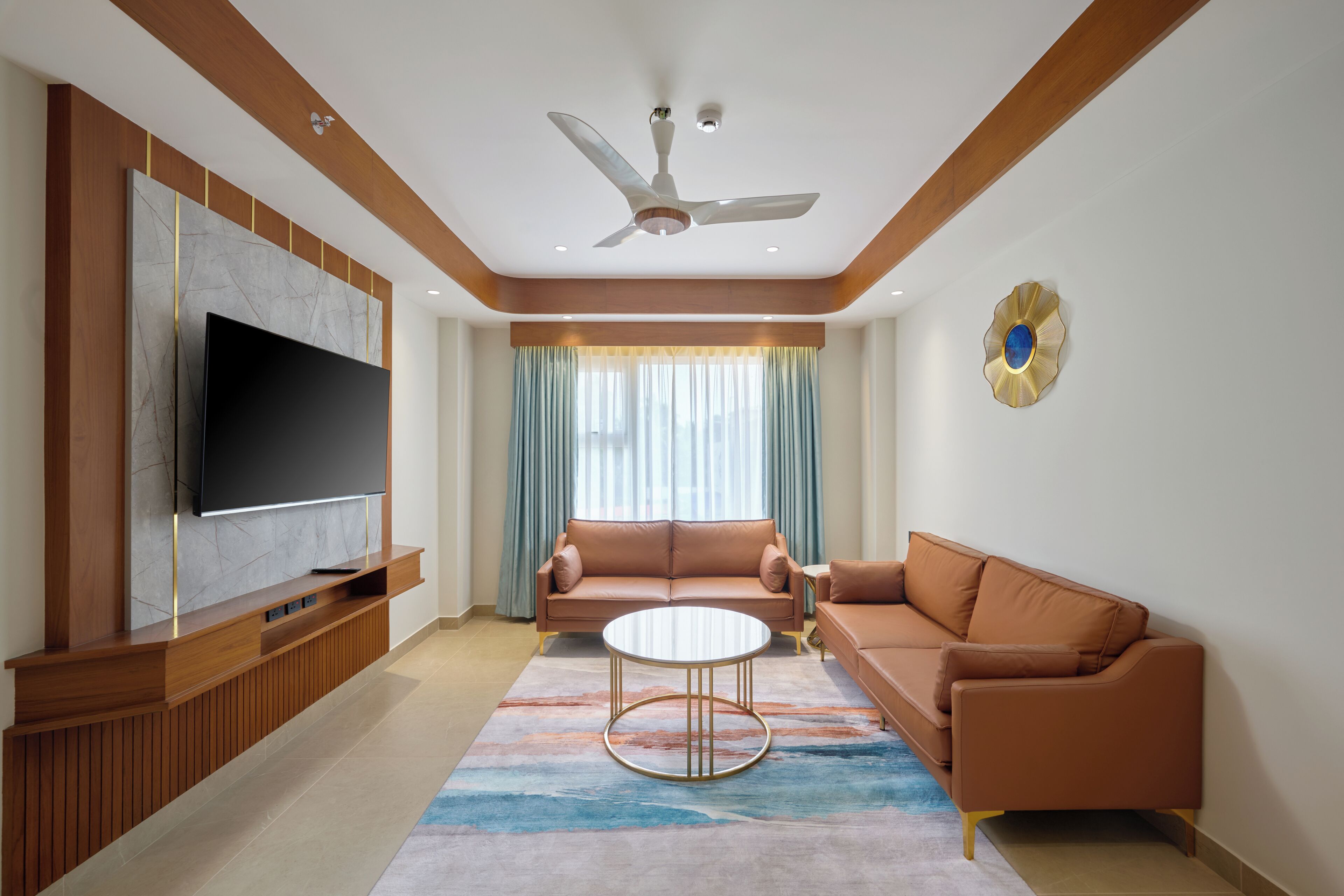 Senior Suite, 1 King Bed | Living area | 55-inch Smart TV with digital channels