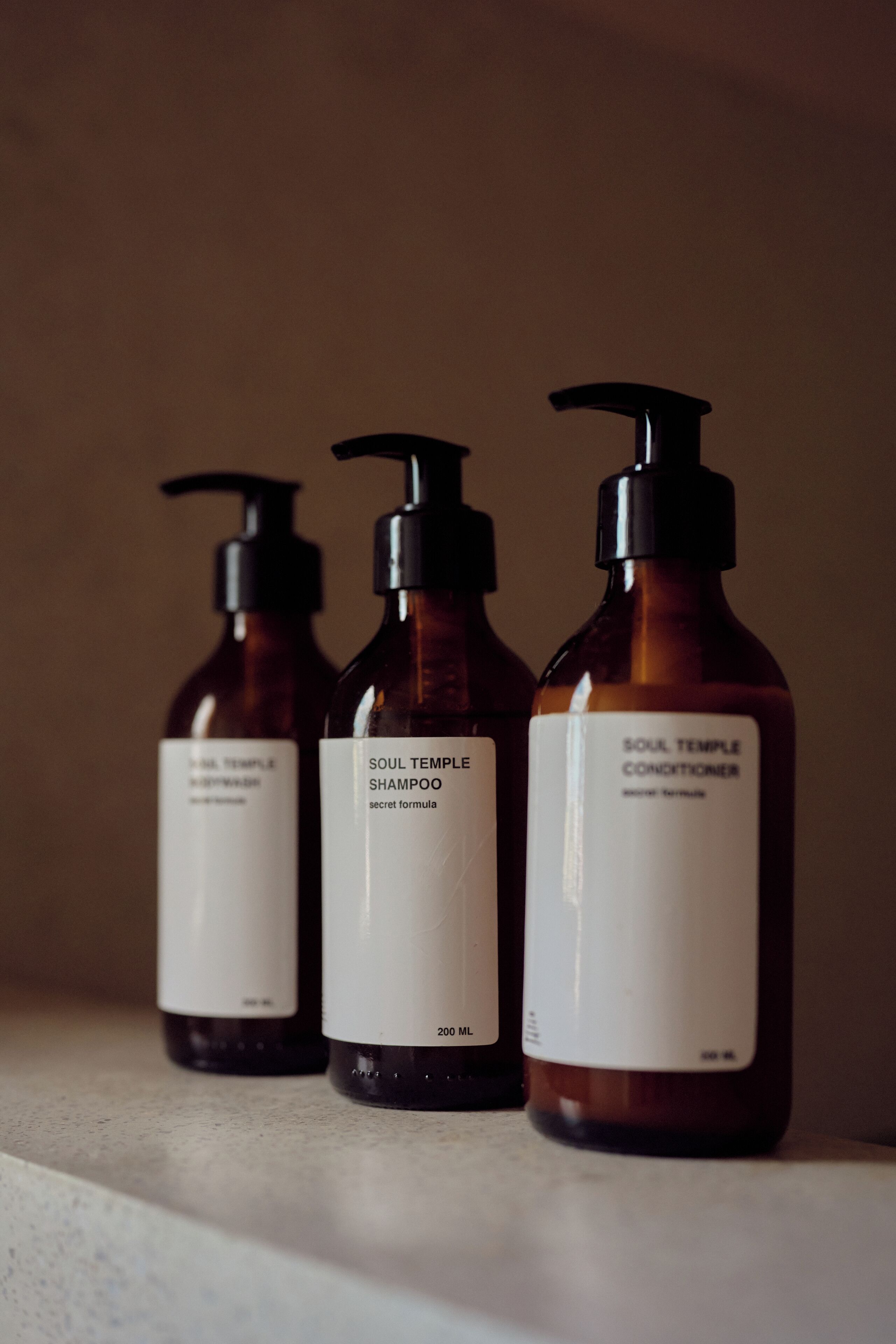 Three bottles of Soul Temple products on a shelf.