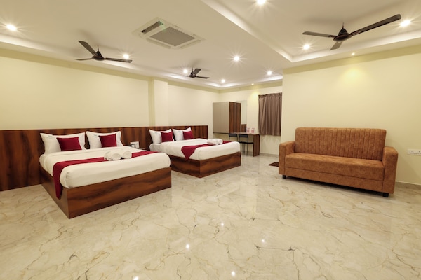 Superior Suite, Hill View | Living area | 15-inch flat-screen TV with cable channels