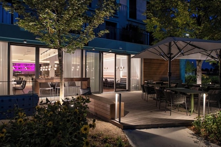 Dinner served, Modern European cuisine, garden views