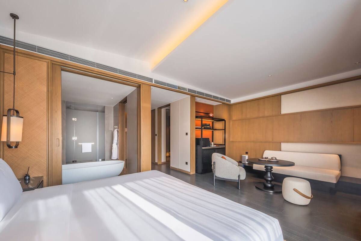 Room, 1 King Bed, Courtyard Area | Down duvets, in-room safe, blackout curtains, iron/ironing board