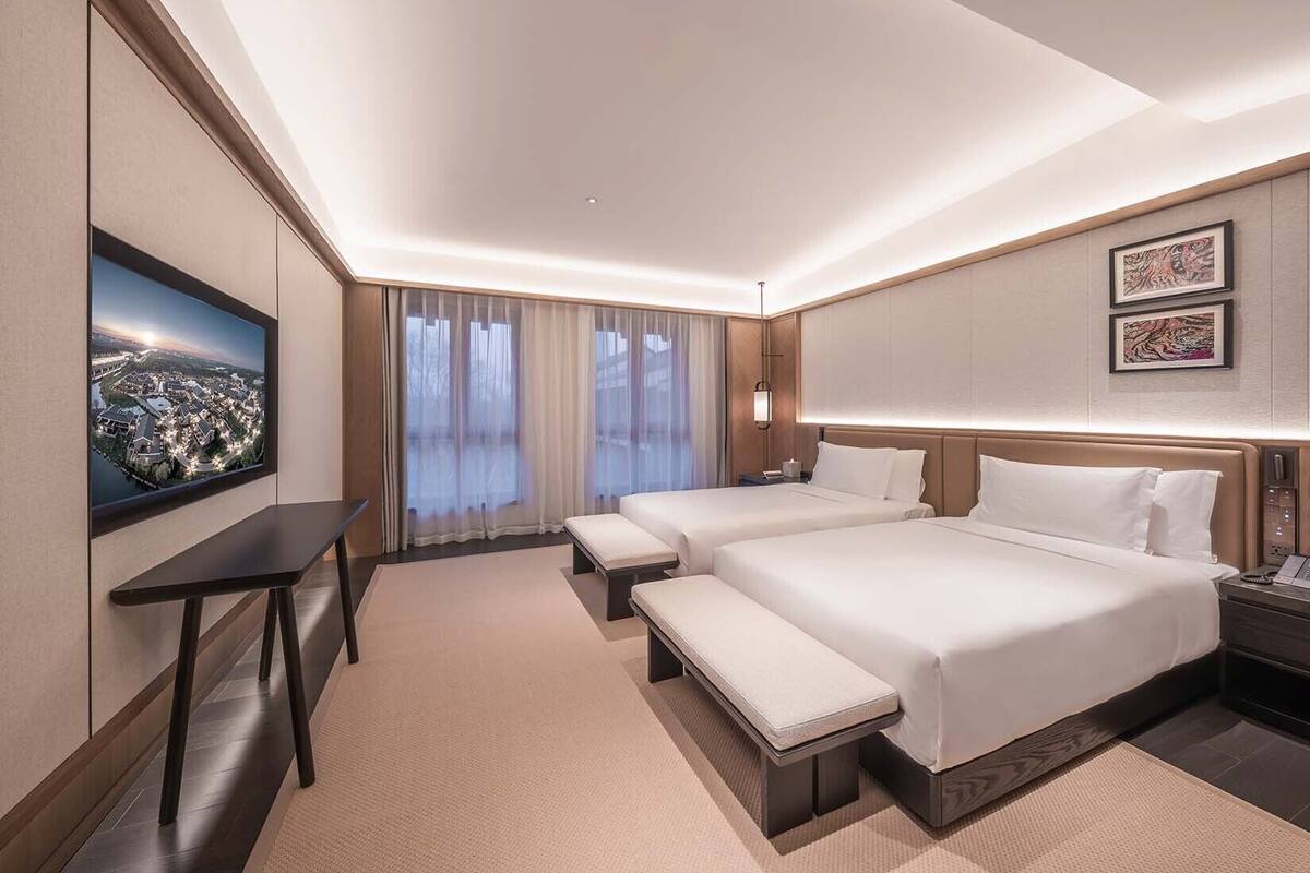 Suite, 2 Single Beds, Garden View | Down duvets, in-room safe, blackout curtains, iron/ironing board