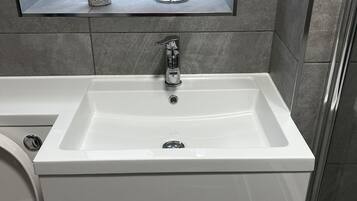 Apartment | Bathroom | Combined shower/tub, deep soaking tub, free toiletries, hair dryer