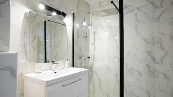 Family Apartment, Patio, Courtyard View | Bathroom | Separate bathtub and shower, free toiletries, towels, soap