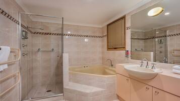 Shower, jetted tub, hair dryer, towels