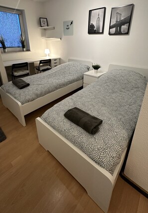 アパートメント シングルベッド 2 台 | 1 室のベッドルーム、WiFi (無料)、ベッドシーツ