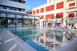 Outdoor pool, pool umbrellas, pool loungers