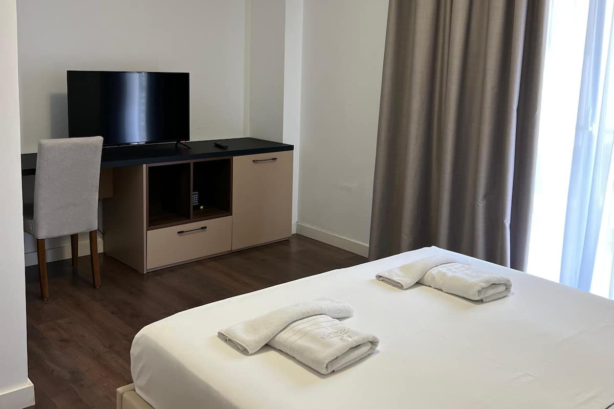 Comfort Double Room, Partial Sea View | In-room safe, soundproofing, iron/ironing board, free cribs/infant beds