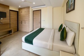 Habitació executiva | Escriptori, espai de treball apte per a portàtils i llits addicionals 