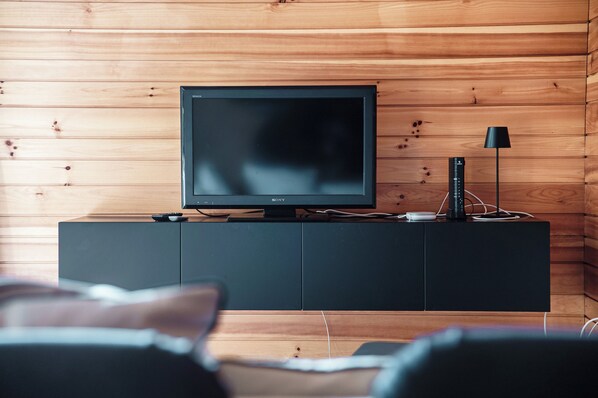 Condo, 2 Bedrooms, Patio | Living area | 32-inch flat-screen TV with satellite channels, fireplace - Maison Dalpe (Dalpe)