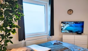 Condo empresarial, 1 cama King, para não fumantes, cozinha americana | TV