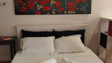 1 habitación y ropa de cama