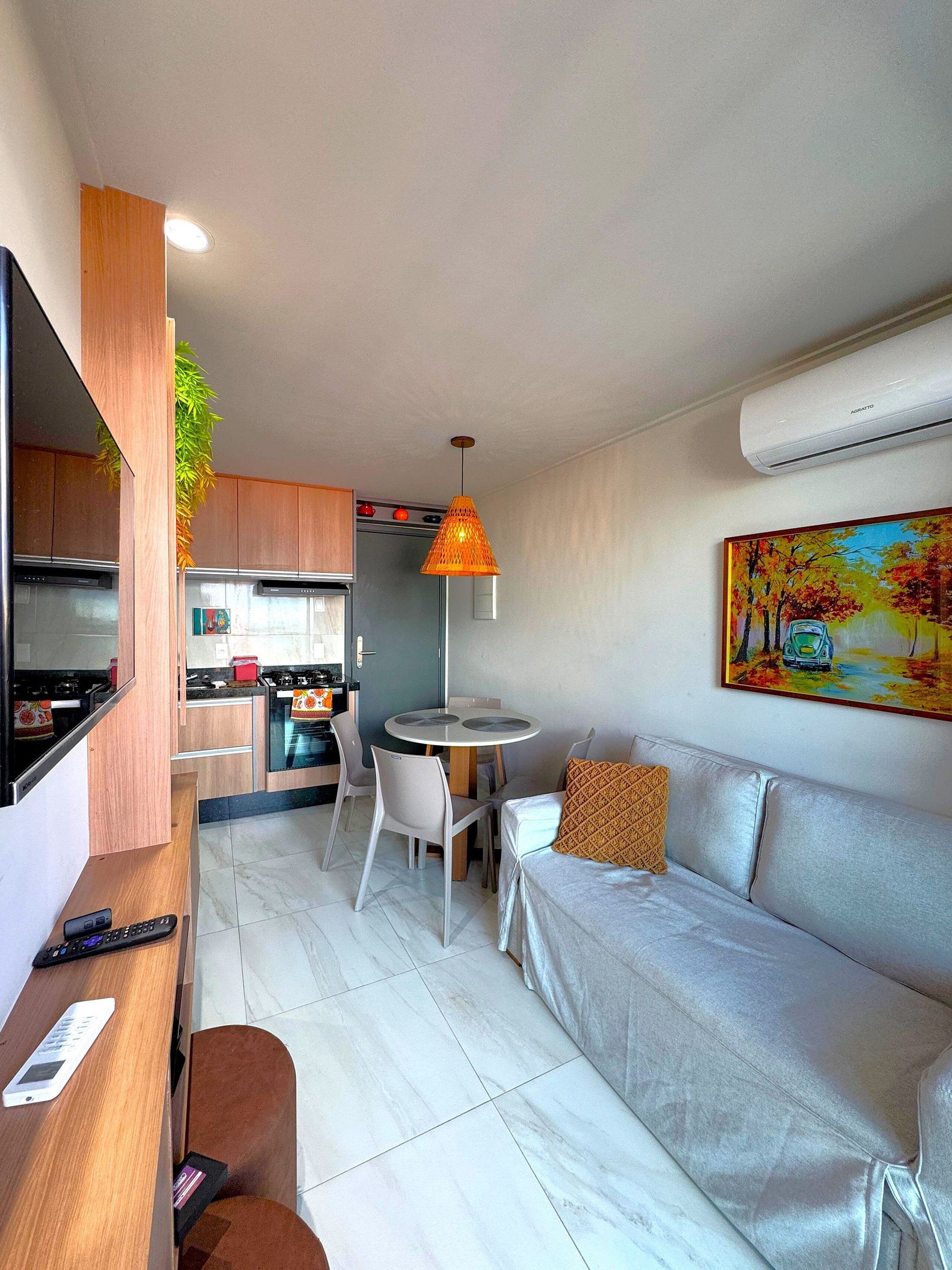 ดีลักซ์อพาร์ทเมนท์ | บริเวณนั่งเล่น | ทีวีจอแบน