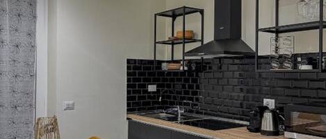 Fridge, microwave, electric kettle, cookware/dishes/utensils