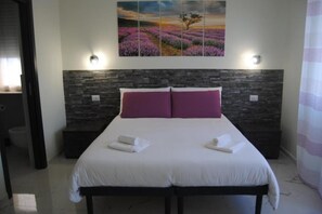 3 bedrooms, desk, iron/ironing board, travel cot