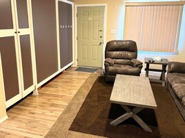 Basic Apartment | Living area | 42-inch Smart TV with cable channels