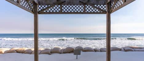 On the beach, sun loungers, beach towels