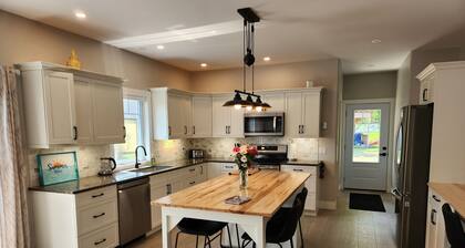 Newly built centrally located, main floor living, open concept & large
patio