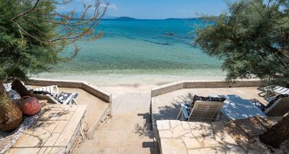 Beachfront villa Mihovil with direct beach access, garden, pool and mooring