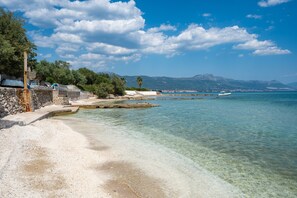 On the beach, sun loungers