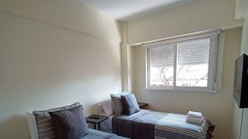 Traditional Apartment, City View | 2 bedrooms, in-room safe, blackout drapes, iron/ironing board