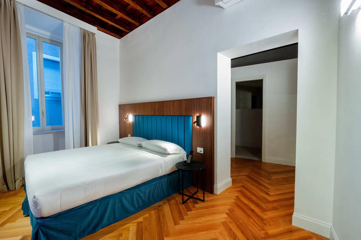 Family Room, City View | 1 bedroom, soundproofing, free WiFi