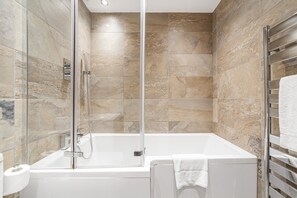 Shower, eco-friendly toiletries, hair dryer, towels